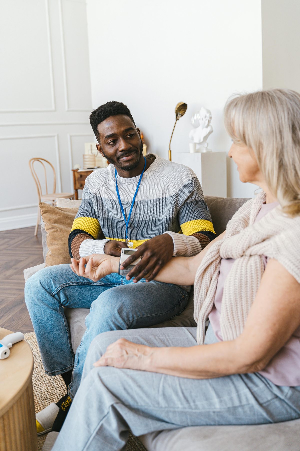 Caregiver providing compassionate care to a senior at home -- New Day Home Care founding story